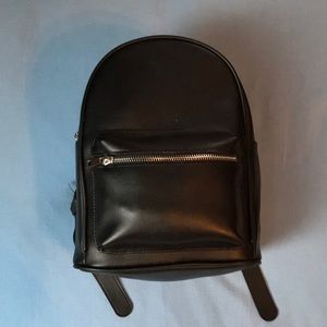 Forever 21 faux leather backpack with sunglasses